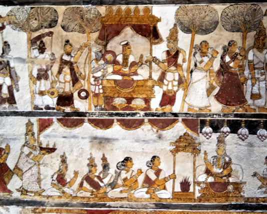 Decorative indian wall art with figures and architectural elements in a traditional style. Depicting the pallava dynaty procession